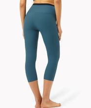 Load image into Gallery viewer, Breathe Capri Legging (New! Black and Blue)
